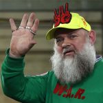 Belgian designer Walter Van Beirendonck acknowledges the audience